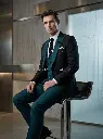 Man_sitting_in_suit_202606011420.webp